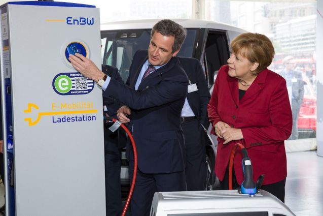 Mutti fakes interest in the 'interchange everywhere' system at an earlier event in Berlin.